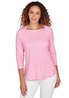 Woman wearing a pink and white striped long-sleeve shirt on a white background