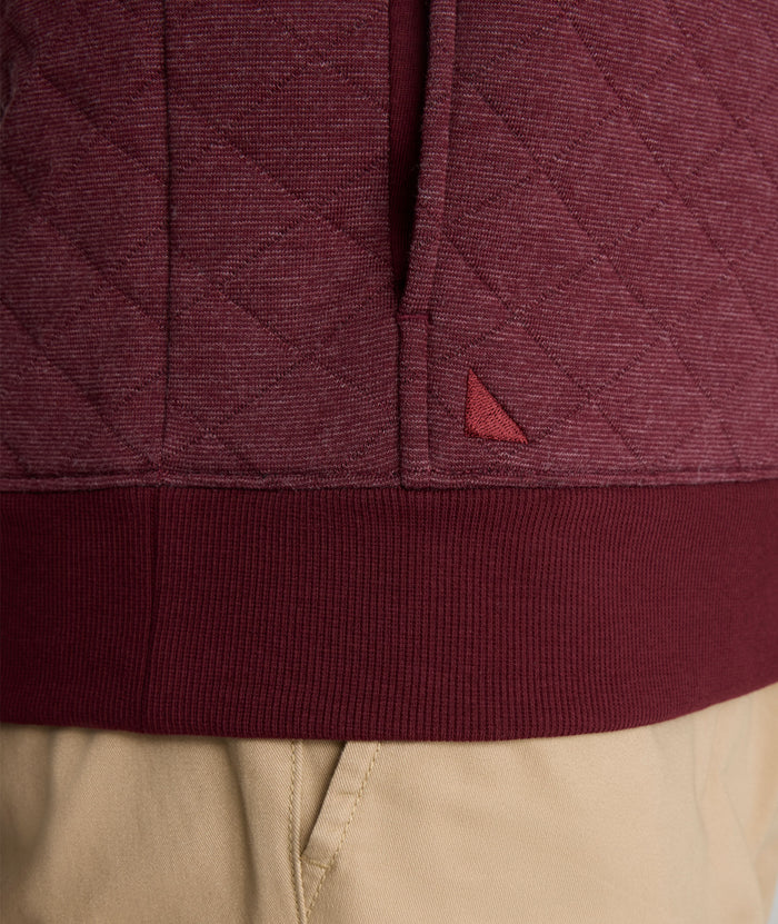 Model is wearing UNTUCKit Garrison Quilted Pullover  in Tawny Port.
