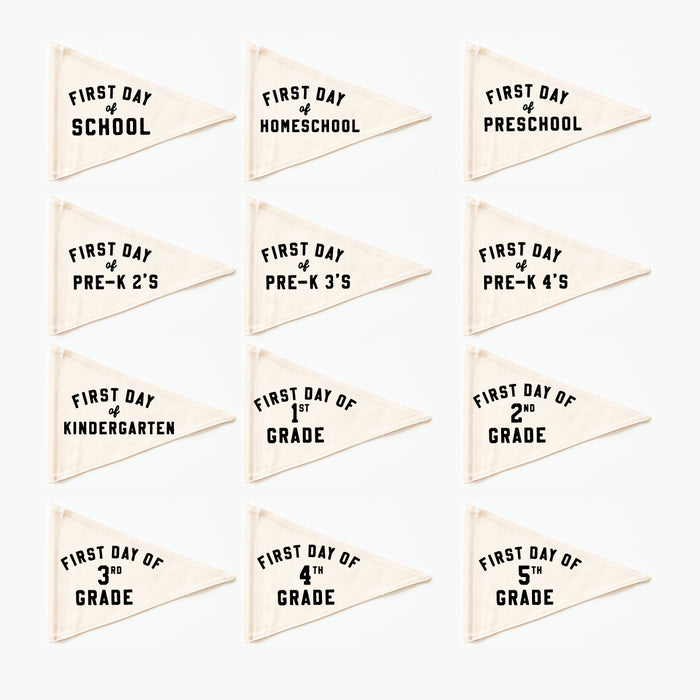 Set of triangle-shaped flags for first day of school celebrations with various grade levels.