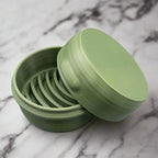 The Rogerie Single Bar Travel Case Round Orchard Leaves