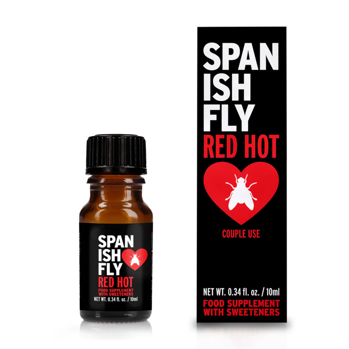 A small, dark brown dropper bottle of Spanish Fly Red Hot stands next to its black and red retail box. Both the bottle label and the box feature a red heart with a white fly graphic inside. The packaging identifies the product as a "FOOD SUPPLEMENT WITH SWEETENERS" and specifies the contents as 0.34 fl. oz./10 mL.