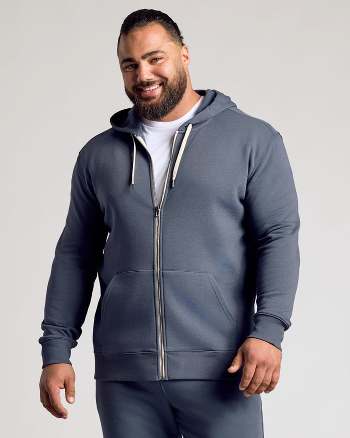 Man models Stormy Full Zip Fleece Hoodie & Jogger 2-Pack.