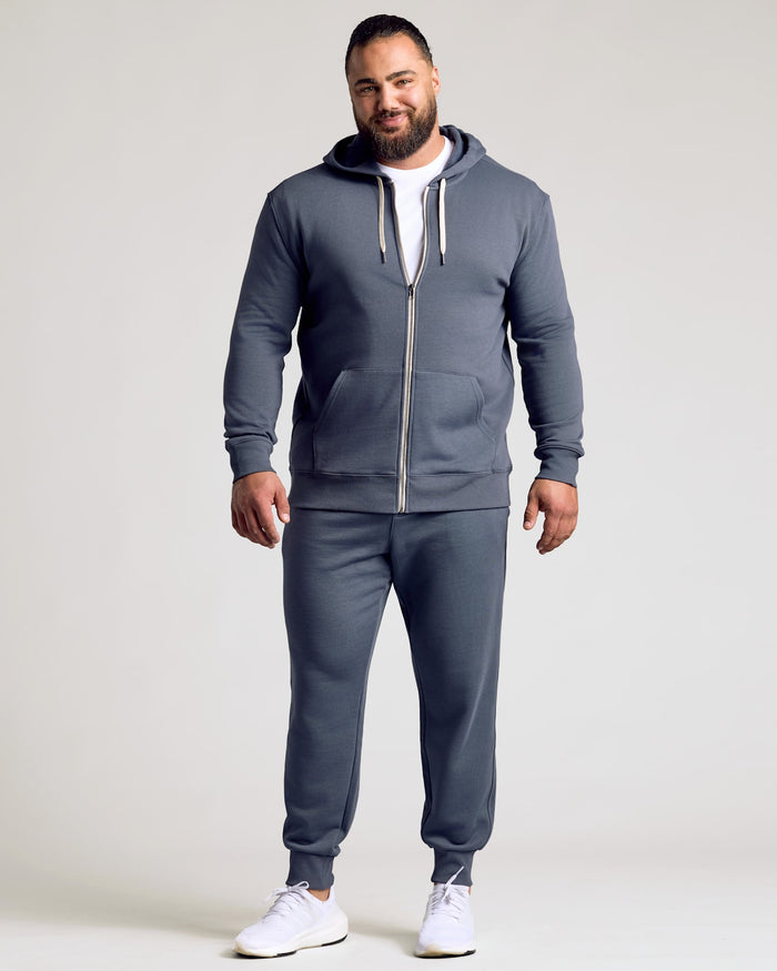 Man wearing Stormy Full Zip Fleece Hoodie & Jogger 2-Pack.