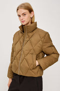 Summit Cropped Puffer Jacket With Stand Collar, Front Zipper, Quilted Detailing, Side Pockets, Tonal Branded Stamp, and Long Sleeves in Ginger Colorway - Upper Body Front View Featured on Model