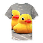 Tank Man Ducky T-Shirt - The jarring contrast of sunbeam yellow (#FFD900) bath toys occupying the exact compositional space of military armor on a grainy asphalt gray (#7A7C7E) roadway.