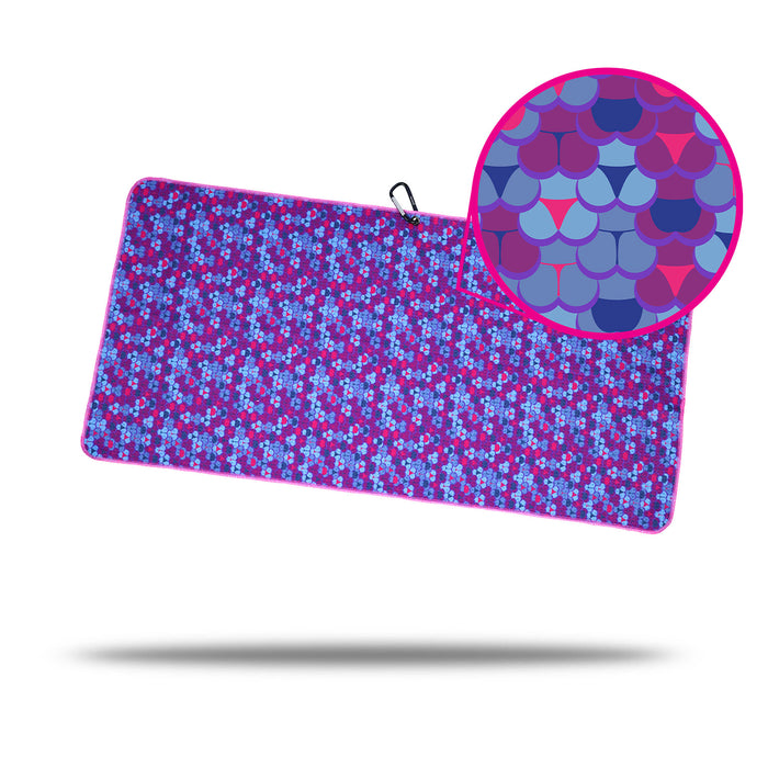 The Whale Tail - Towel features a vibrant blue and magenta geometric pattern with 2-sided print. A close-up shows overlapping scallop shapes in magenta, blue, purple, and turquoise tones. The towel appears to float with a soft shadow below.